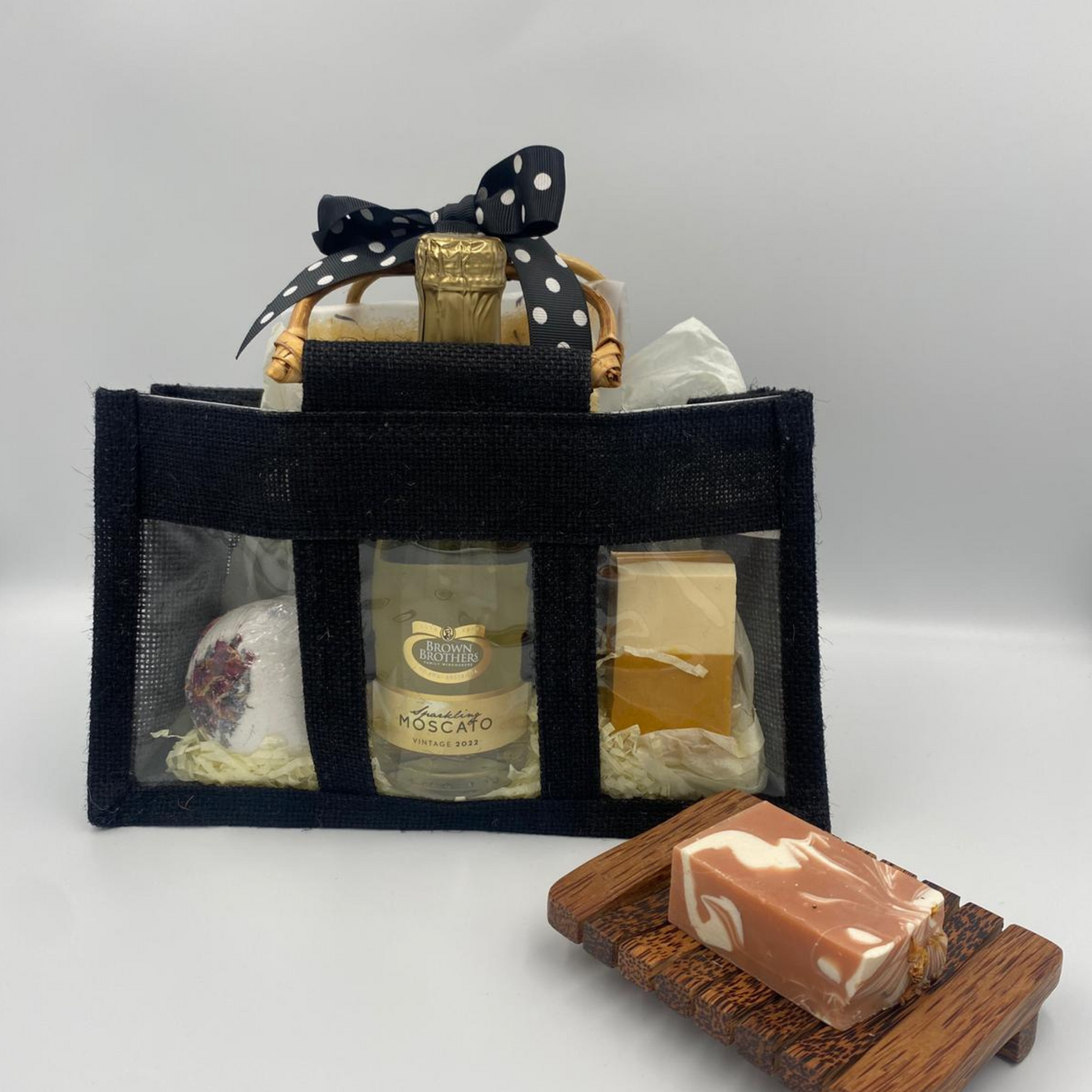 Mother's Day Luxury Black Bath Bag containing a half size soap, bath salts, bath bomb and Brown Brothers Sparkling Moscato.